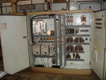 This a cnc retrofit of a Devlieg 4B60 horizontal mill with a Dynapath Delta 2000 and a new Yaskawa 3 axes servo system.  This is the before (left) and after (right) picture of the electrical cabinet. 