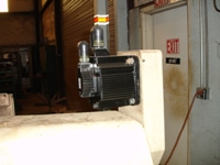 Before and after picture of the Z axis motor on the Devlieg 4B60 CNC retrofit.  