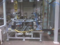 This a multi stage special machine that loads a measured amount of powder into a cannister.  